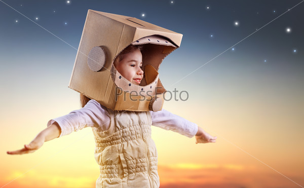 child is dressed in an astronaut costume