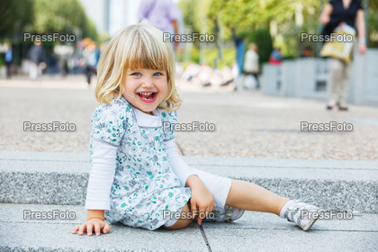 Cute little girl walking to la Defense, Paris