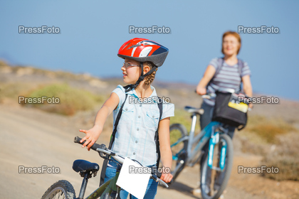 girl and her grandmother on bikes
