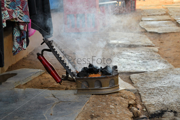 Charcoal iron still in use on Indian street