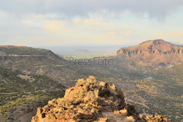 Sweeping landscape of desert landscape in Santa Fe valley from a viewpoint near Los Alamos, New Mexico, USA, stock photo