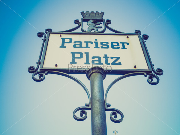 Vintage looking Pariser Platz street sign in Berlin Germany