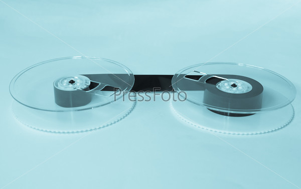 Magnetic tape reel for computer data and audio video storage - cool cyanotype