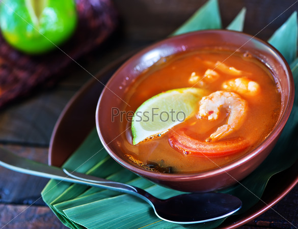 Tom yam soup in the brown bowl, stock photo
