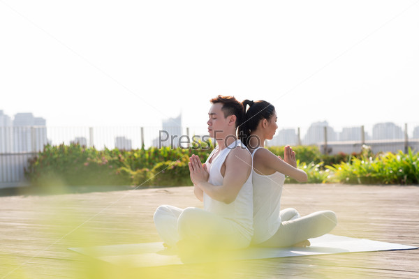 Couple in lotus position