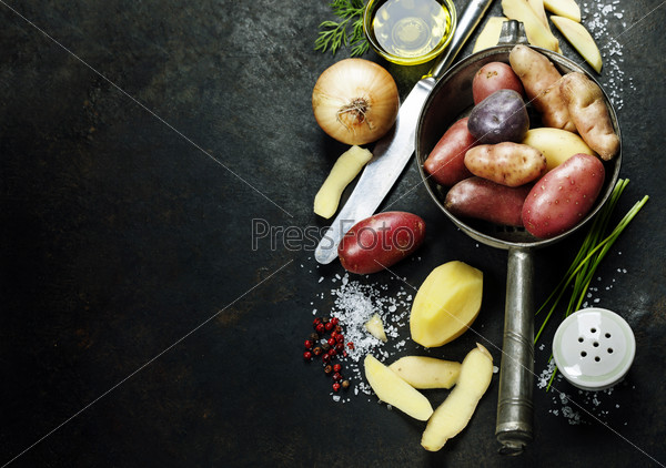 Potato preparation. Fresh organic vegetables. Food background. Healthy food from garden