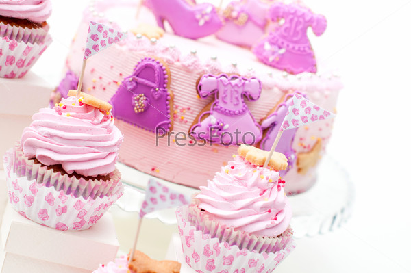 pink and violet girl\'s birthday cake on the plate