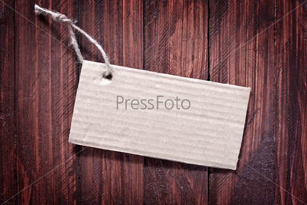 note on wooden background