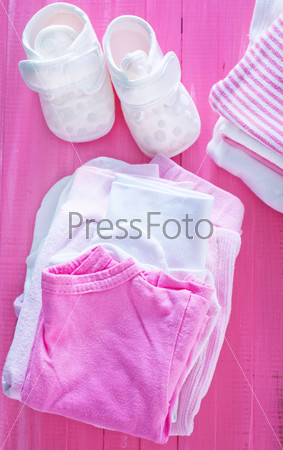 baby clothes on the table, clothes for girl