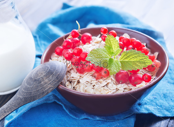 Stock Photo: oat flakes with red currant