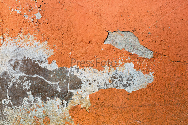 Old orange painted grunge concrete wall. Abstract background.