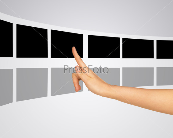 Woman pressing virtual photo within right pointer finger on isolated background