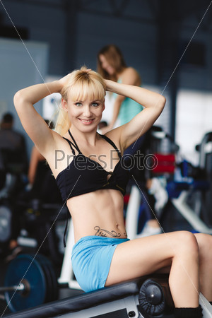Woman working out in fitness - Active girl. beautiful athletic woman working ab intervals