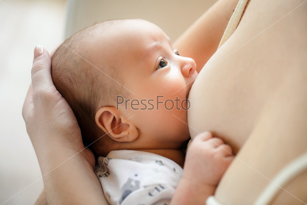 Mother care. Breast feeding baby. mother feeding baby soft focus. young mother breast feeding her infant