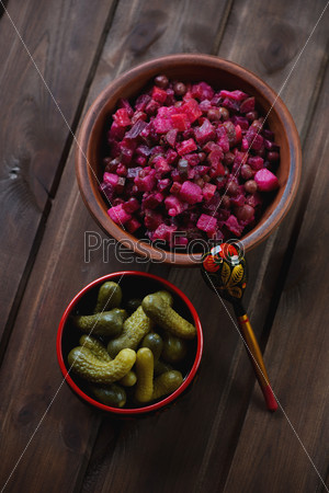 Russian vinegret salad with beetroot, pickled cucumbers and other vegs