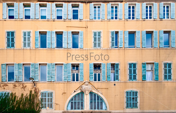 Texture of typical sothern french windows at the street \