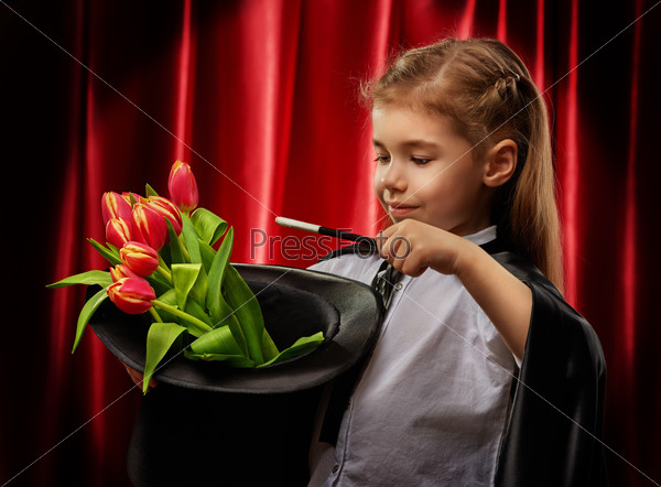 The little magician does tricks, stock photo