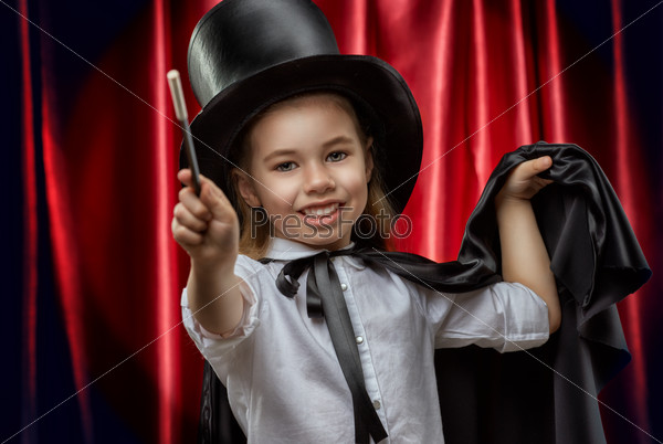 The little magician does tricks, stock photo