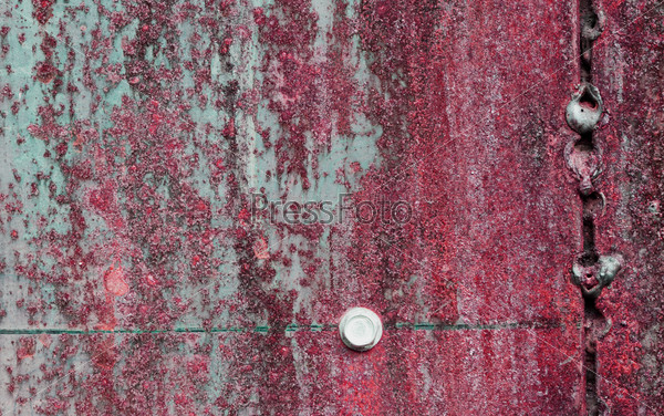scratched and rusty red metal surface