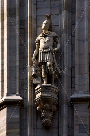a roman soldier in the front of the dome of milan