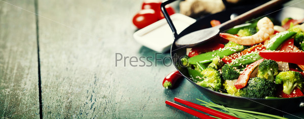 Colorful stir fry in a wok