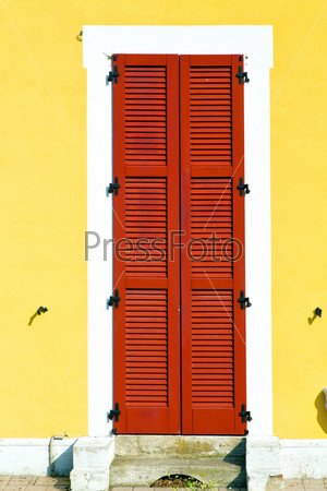 red window  varano borghi palaces italy   abstract  sunny day    wood venetian blind in the concrete  brick