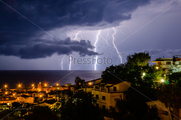 Lightning over the sea, night scene, stock photo