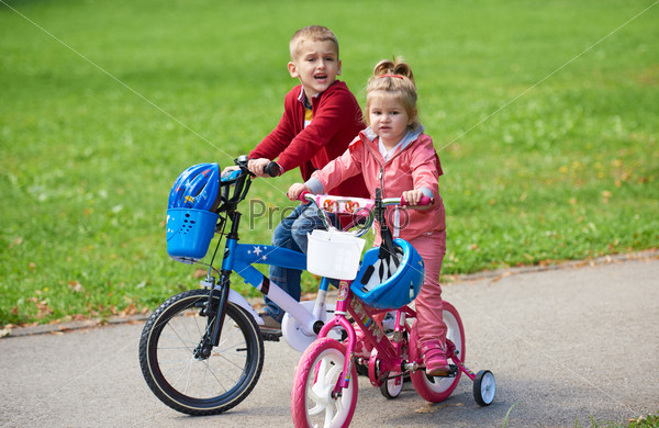 boy and girl with bicycle