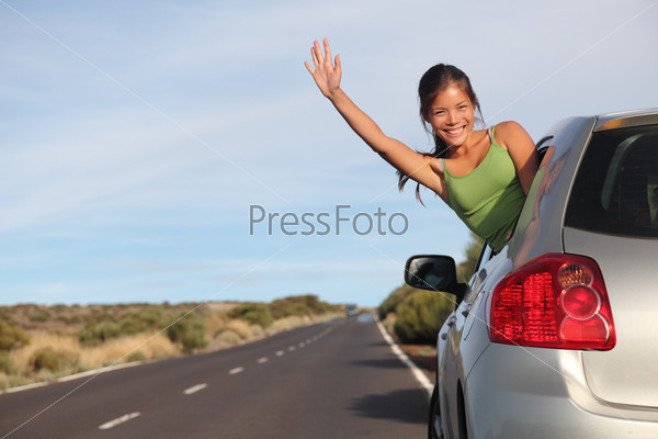 Woman in car road trip
