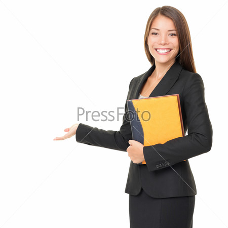 Woman real estate agent / realtor showing open hand showing blank space for advertisement. Isolated on white background.