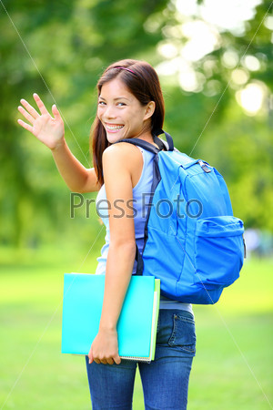 Woman student waving
