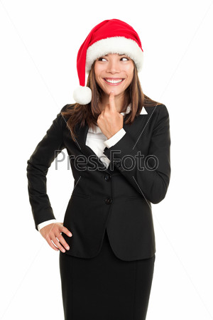 christmas business woman thinking looking to the side wearing santa hat and business suit. Multi-racial santa businesswoman isolated on white background.