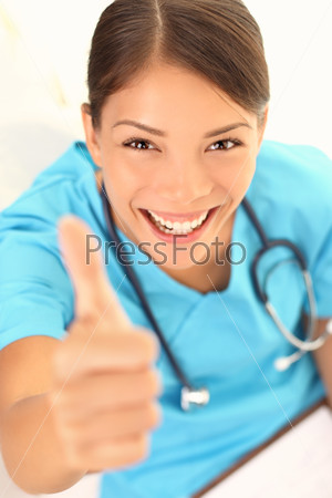 Nurse happy thumbs up smile