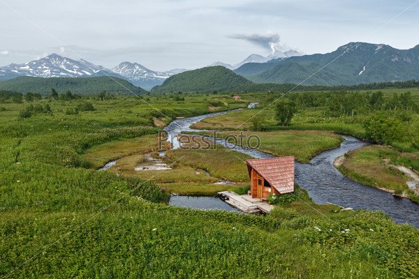 Beautiful summer landscape of Kamchatka: view of Goryacherechensky group hot springs, Goryachaya River in nature park Nalychevo. Russia, Far East, Kamchatka Peninsula.