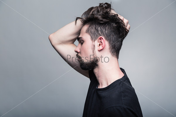 Portrait of young man in  black T-shirt