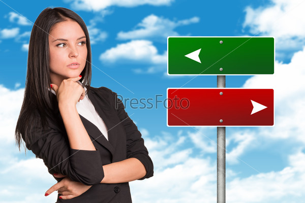Thoughtful businesswoman looking to right side