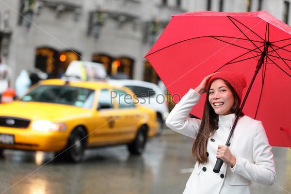 New York City Manhattan woman with fall umbrella