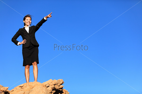 Business concept - woman pointing at future