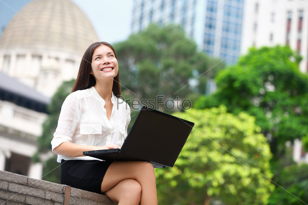 Business woman with computer laptop in Hong Kong