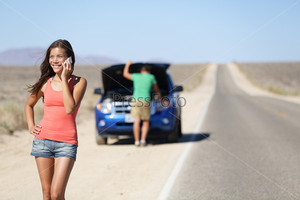 Car breakdown - woman phone calling auto service