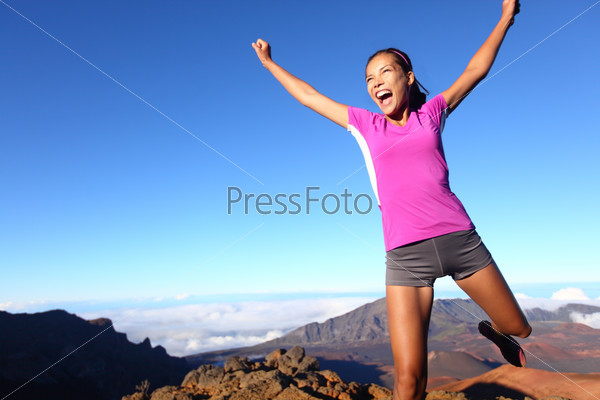 Success winner fitness runner woman jumping