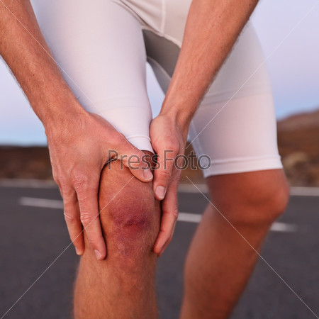 Knee injury - athlete runner with sport injury