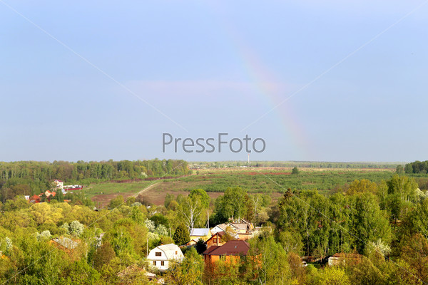 Beautiful landscape of the Russian village with forests and fields