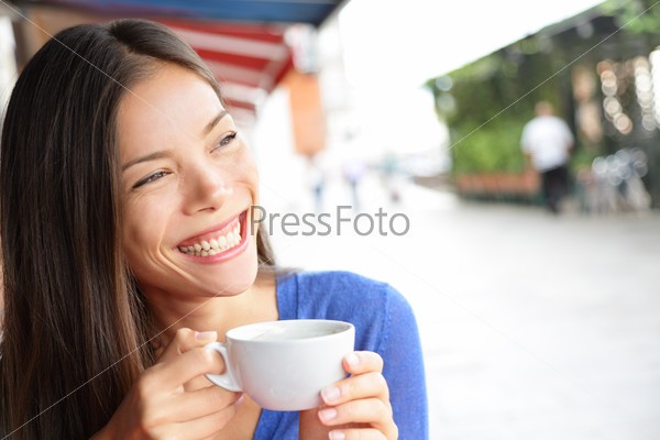 Woman in Venice, Italy at cafe drinking coffee