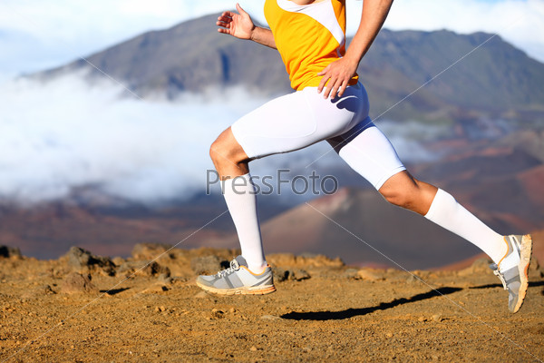 Trail running - male runner in cross country run