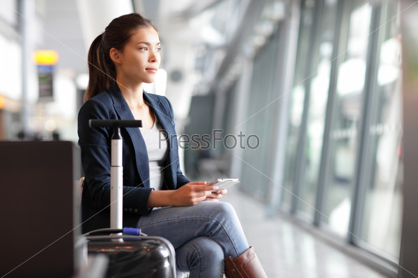 Stock Photo: Passenger traveler woman in airport