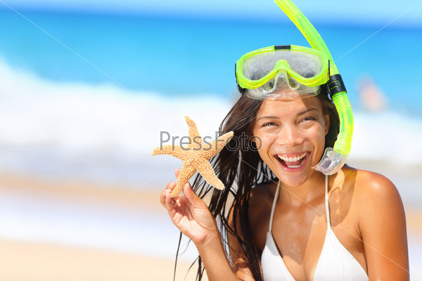 Beach travel woman with snorkel on vacation