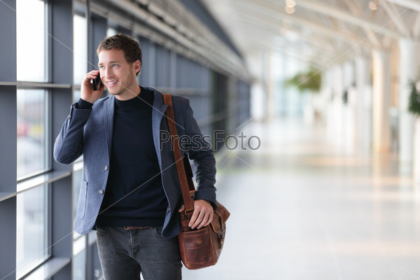 Urban business man talking on smart phone