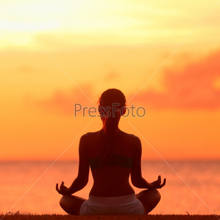 Meditation - Meditating yoga woman at beach sunset