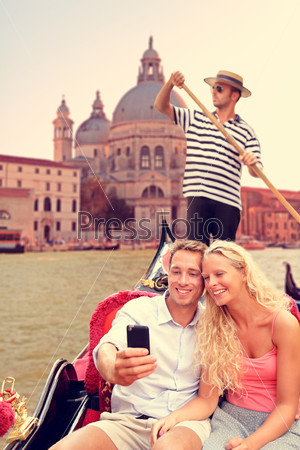 Couple in Venice on Gondola ride on canal grande